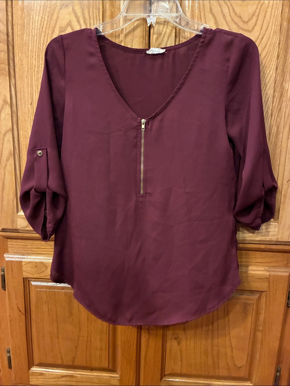 Small Tovia Zip-Front Maroon V-Neck Blouse with Three Quarter Roll-Tab Sleeves